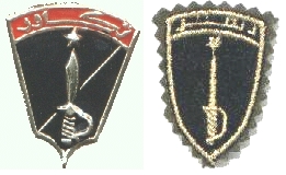 This image displays a military insignia . Copyrighting combatant identification and/or rank insignia violates international law; hence this image can not be copyrighted. This applies worldwide. Note that the use of such symbols is restricted in many countries independently of the copyright status. Please respect the law!